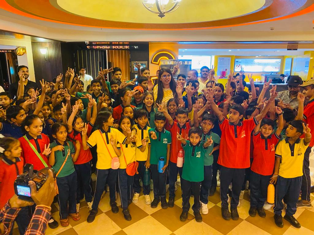 Children receiving education kits